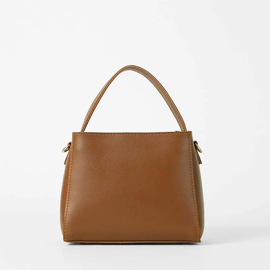 Brown handbag on a white background